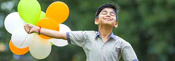 Indian child with balloonss